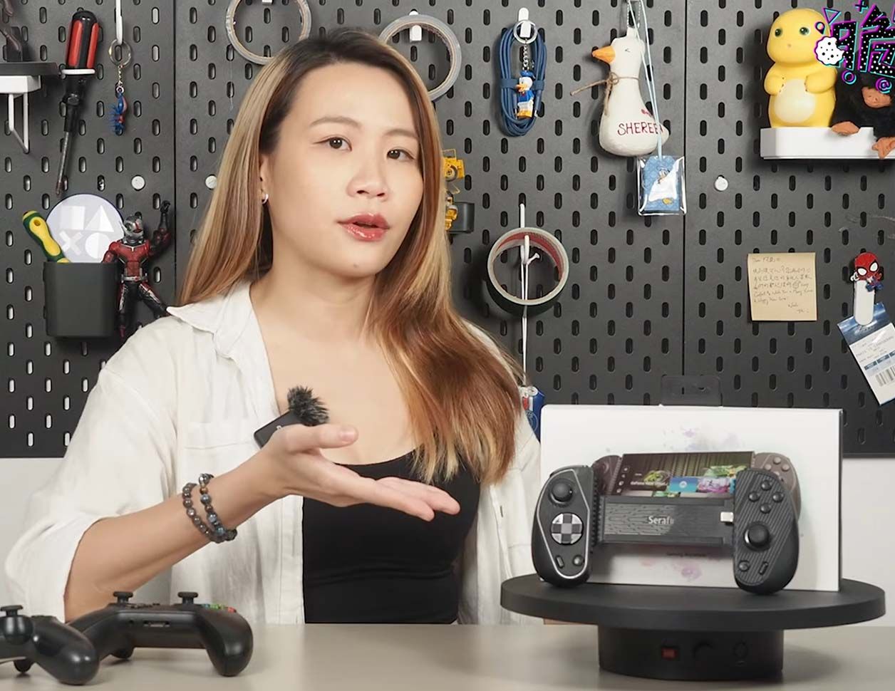 Shereen Crispy unboxes the Serafim S3 Cloud Gaming Controller in her studio
