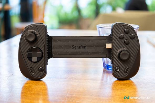 Serafim S3 Game Controller on a table in the coffee shop